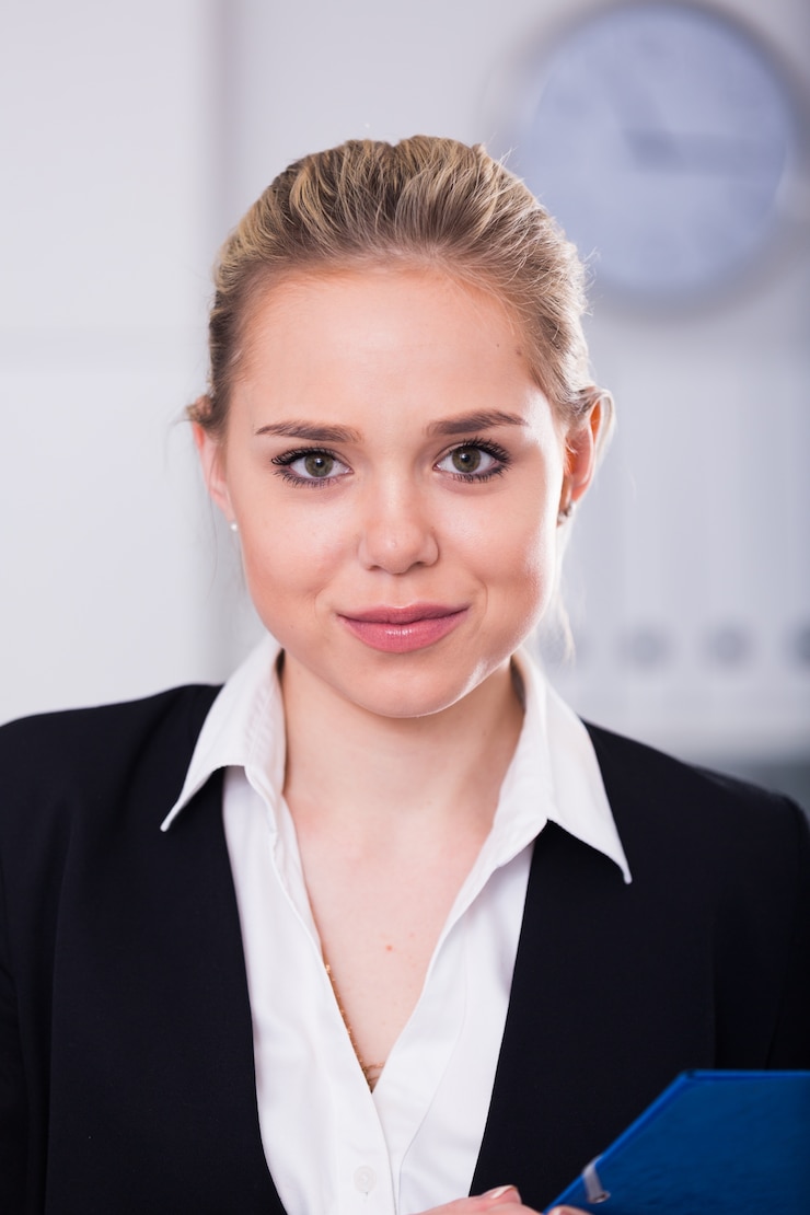 Portrait of Sitting Brown Haired Businesswoman